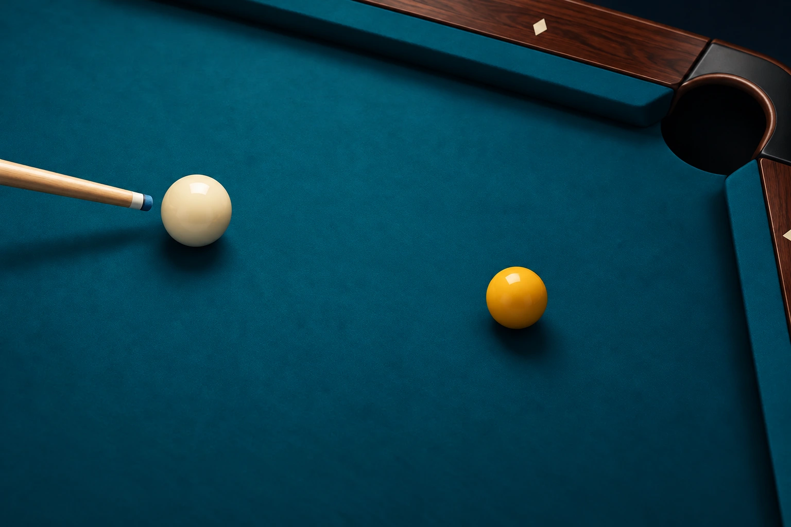 One resting cue ball and one resting object ball on pool cloth, with a cue tip clearly separated from the cue ball and no motion overlays