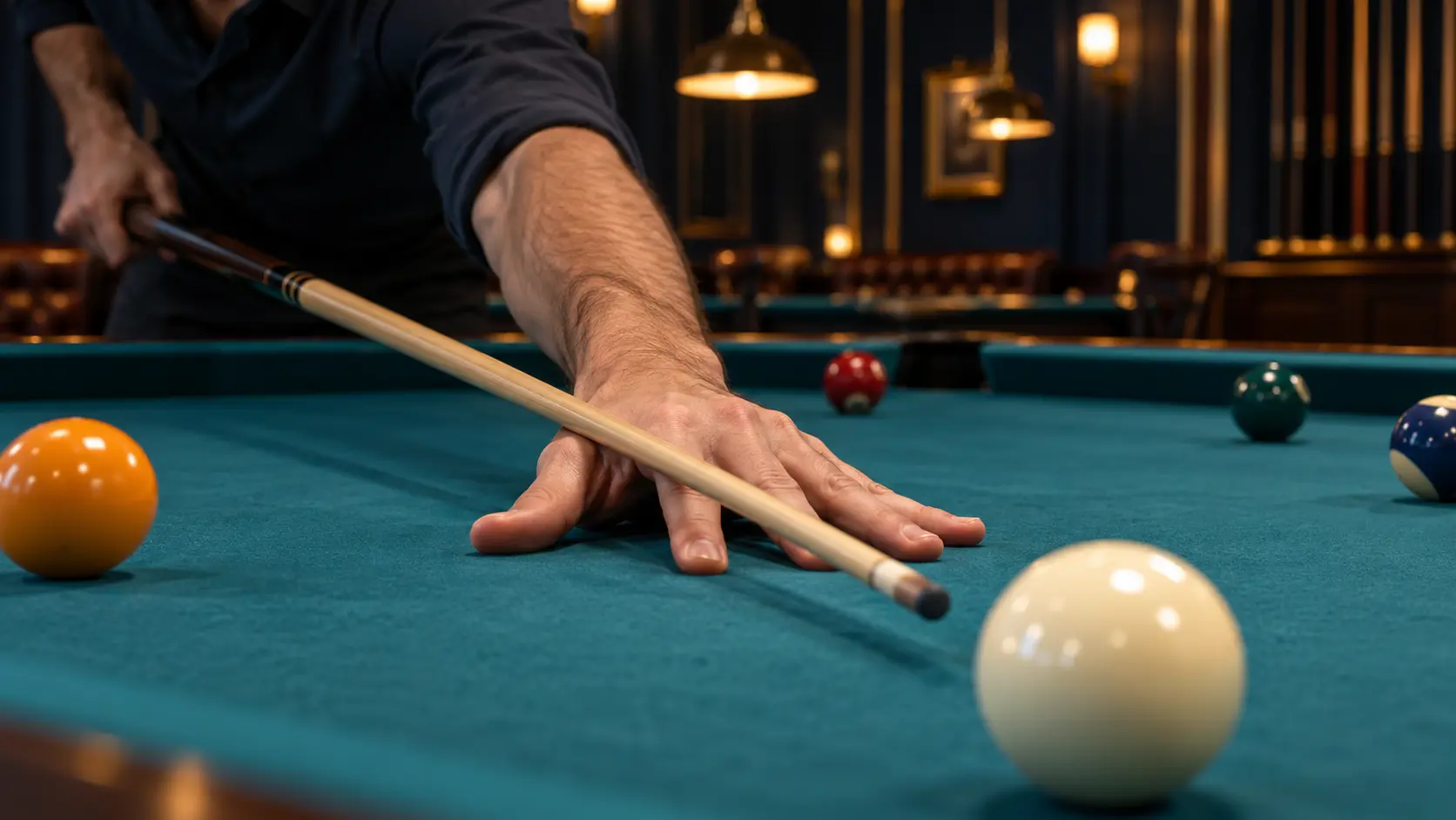 Editorial close-up of a relaxed open bridge hand forming a broad stable base on teal pool-table cloth