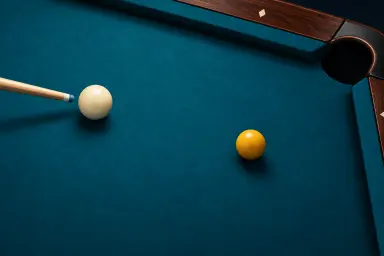 One resting cue ball and one resting object ball on pool cloth, with a cue tip clearly separated from the cue ball and no motion overlays